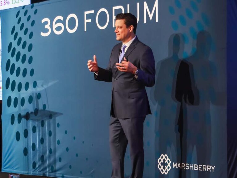 presenter on stage at 360 forum