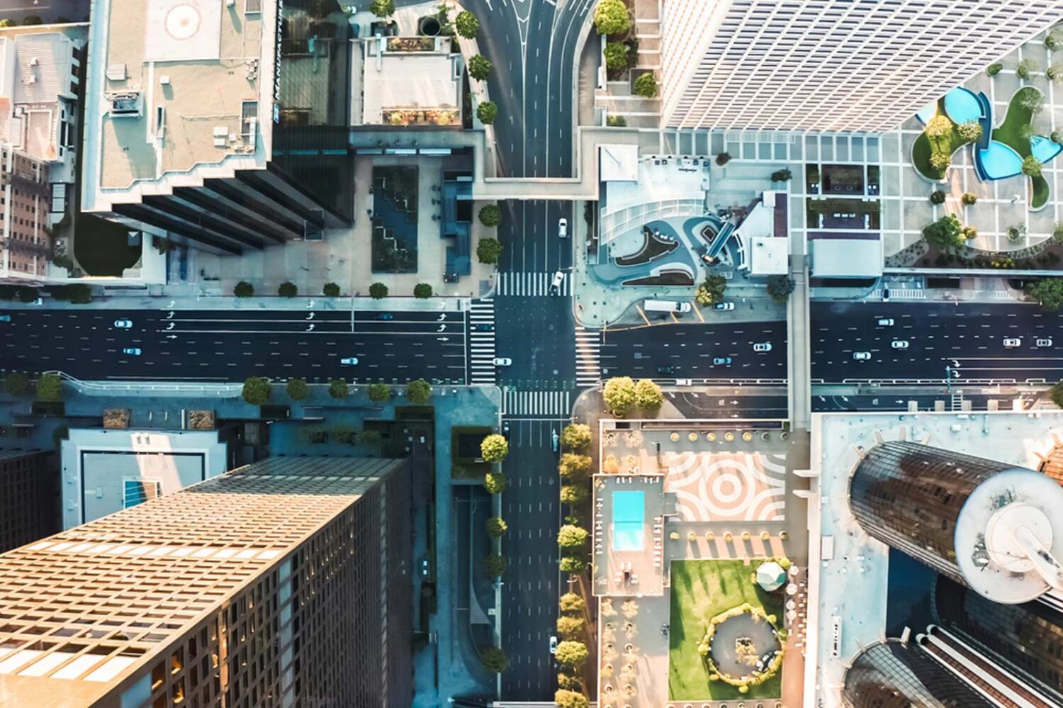 overhead photo of city buildings and roads