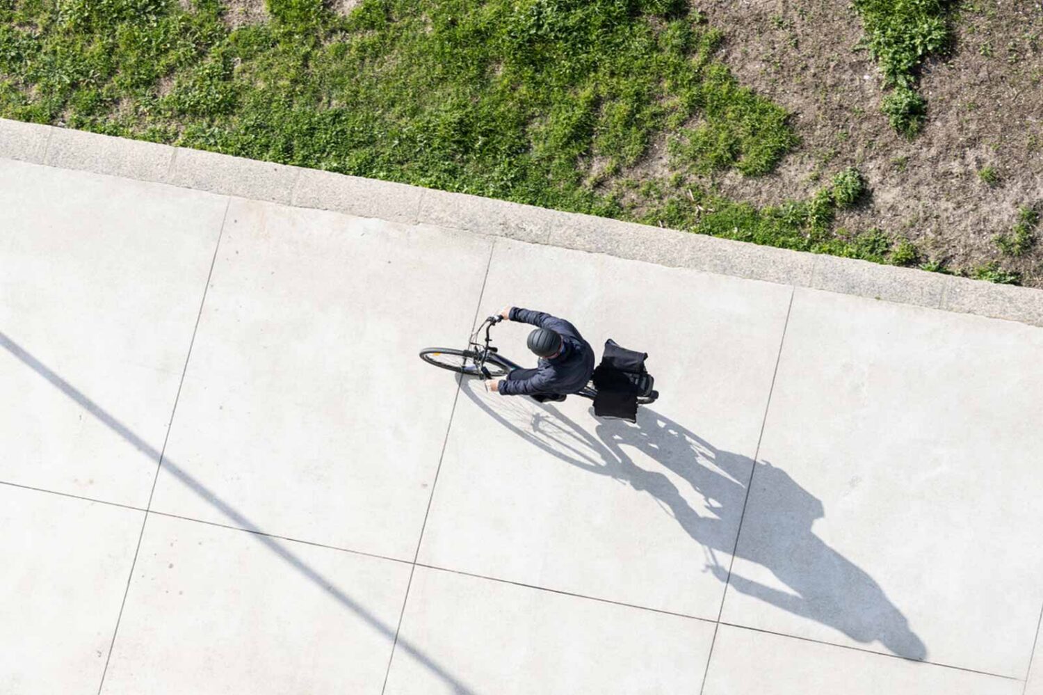 overhead photo of person riding a bike